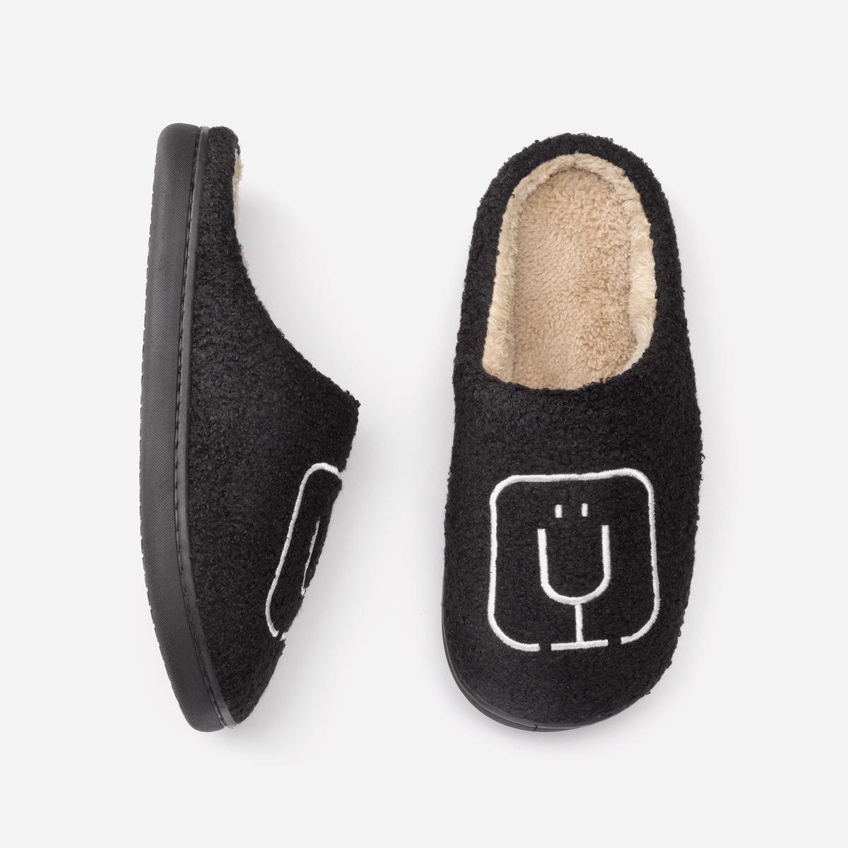 brumate-fuzzy-slippers-black-d1 apparel-slippers-above.png